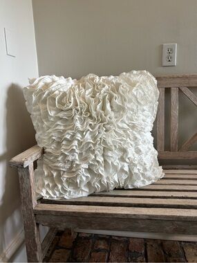 White ruffle pillow
